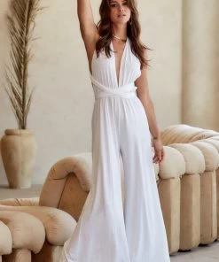 Modern Bridge International Co,Ltd. FLAT/RM B 3/F WING CHEONG COMM BLDG 19-25 JERVOIS STREET SHEUNG WAN HKWINK California Coast White Wrap Top Jumpsuit CLOTHING 23 Modern Bridge International Co,Ltd. FLAT/RM B 3/F WING CHEONG COMM BLDG 19-25 JERVOIS STREET SHEUNG WAN HKWINK California Coast White Wrap Top Jumpsuit CLOTHING