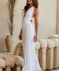 Modern Bridge International Co,Ltd. FLAT/RM B 3/F WING CHEONG COMM BLDG 19-25 JERVOIS STREET SHEUNG WAN HKWINK California Coast White Wrap Top Jumpsuit CLOTHING 21 Modern Bridge International Co,Ltd. FLAT/RM B 3/F WING CHEONG COMM BLDG 19-25 JERVOIS STREET SHEUNG WAN HKWINK California Coast White Wrap Top Jumpsuit CLOTHING