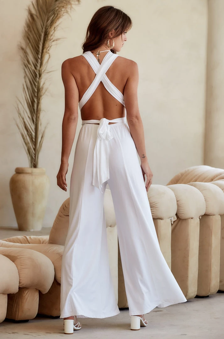 Modern Bridge International Co,Ltd. FLAT/RM B 3/F WING CHEONG COMM BLDG 19-25 JERVOIS STREET SHEUNG WAN HKWINK California Coast White Wrap Top Jumpsuit CLOTHING 4 Modern Bridge International Co,Ltd. FLAT/RM B 3/F WING CHEONG COMM BLDG 19-25 JERVOIS STREET SHEUNG WAN HKWINK California Coast White Wrap Top Jumpsuit CLOTHING