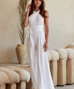 Modern Bridge International Co,Ltd. FLAT/RM B 3/F WING CHEONG COMM BLDG 19-25 JERVOIS STREET SHEUNG WAN HKWINK California Coast White Wrap Top Jumpsuit CLOTHING 27 Modern Bridge International Co,Ltd. FLAT/RM B 3/F WING CHEONG COMM BLDG 19-25 JERVOIS STREET SHEUNG WAN HKWINK California Coast White Wrap Top Jumpsuit CLOTHING