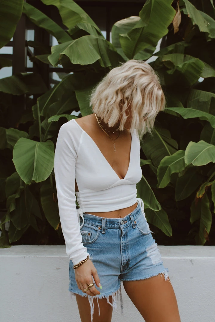 Modern Bridge International Co,Ltd. FLAT/RM B 3/F WING CHEONG COMM BLDG 19-25 JERVOIS STREET SHEUNG WAN HKWINK CLOTHING Nala White Crop Top 3 Modern Bridge International Co,Ltd. FLAT/RM B 3/F WING CHEONG COMM BLDG 19-25 JERVOIS STREET SHEUNG WAN HKWINK CLOTHING Nala White Crop Top