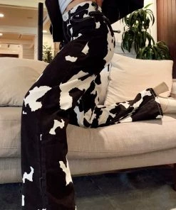 Modern Bridge International Co,Ltd. FLAT/RM B 3/F WING CHEONG COMM BLDG 19-25 JERVOIS STREET SHEUNG WAN HKWINK CLOTHING Midland Black Cow Print Jeans